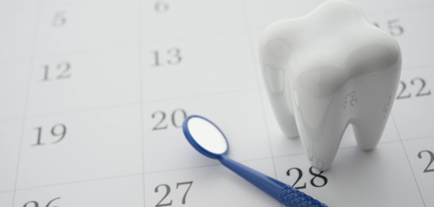 Close-up of dental appointment marked on calendar