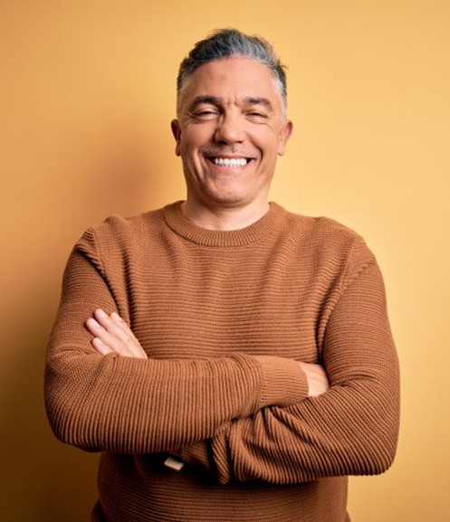 Portrait of happy, smiling middle-aged man