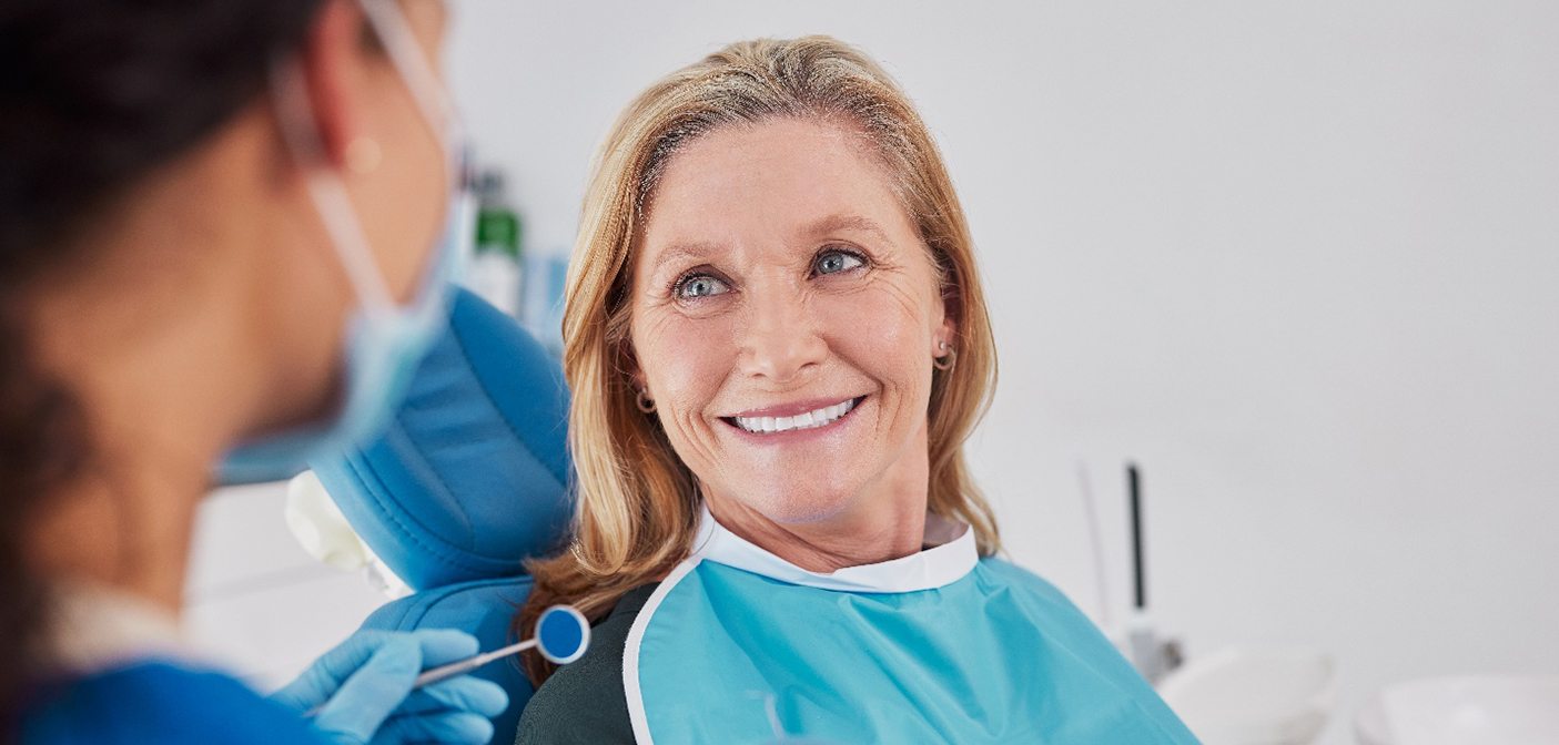 Happy, smiling senior woman in treatment chair