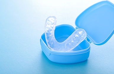 Clear nightguard in blue carrier case