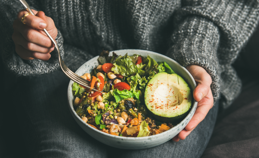 Woman holding salad bowl